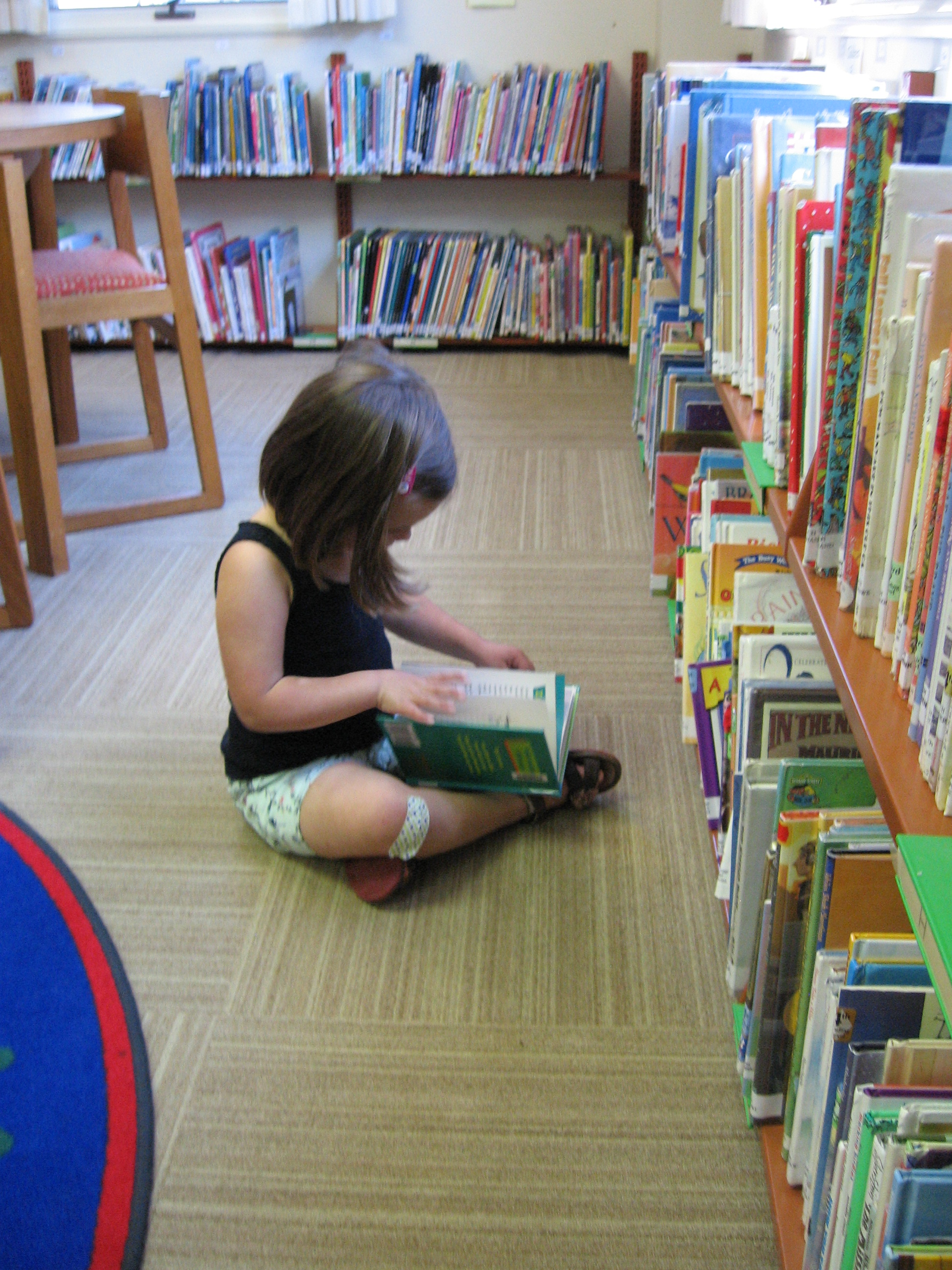 Amelia Tenbusch reading after Story time